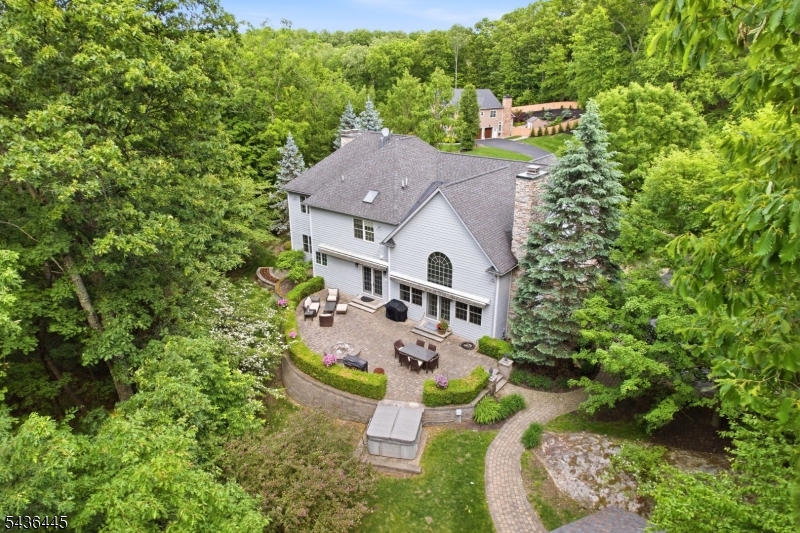 4 Windemere Way Sparta, NJ 07871 - Photo 48 of 50 an aerial view of a house with garden space sitting space and trees all around