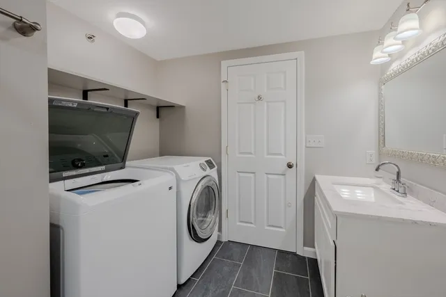 a utility room with dryer and washer