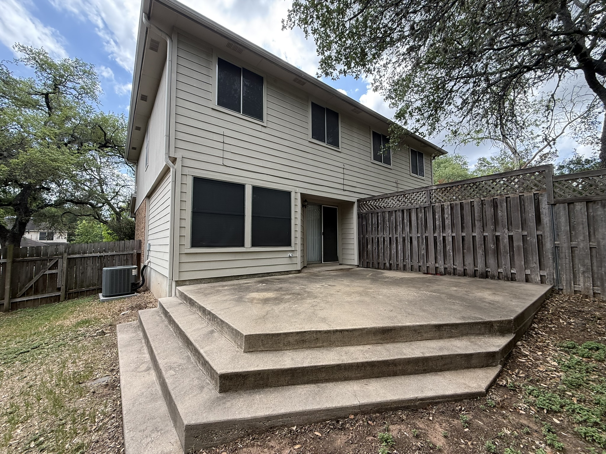 2304 Granberry Drive, Unit B Austin, TX 78745 - Photo 5 of 24 Multi-level concrete patio with integrated steps