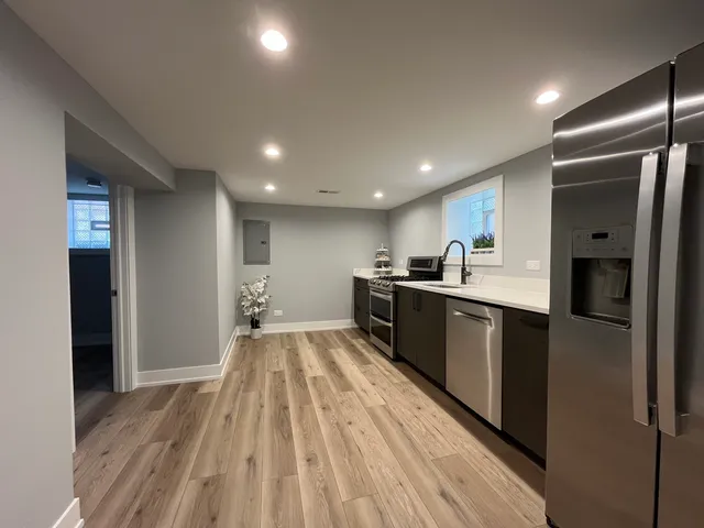 a large kitchen with a lot of counter space