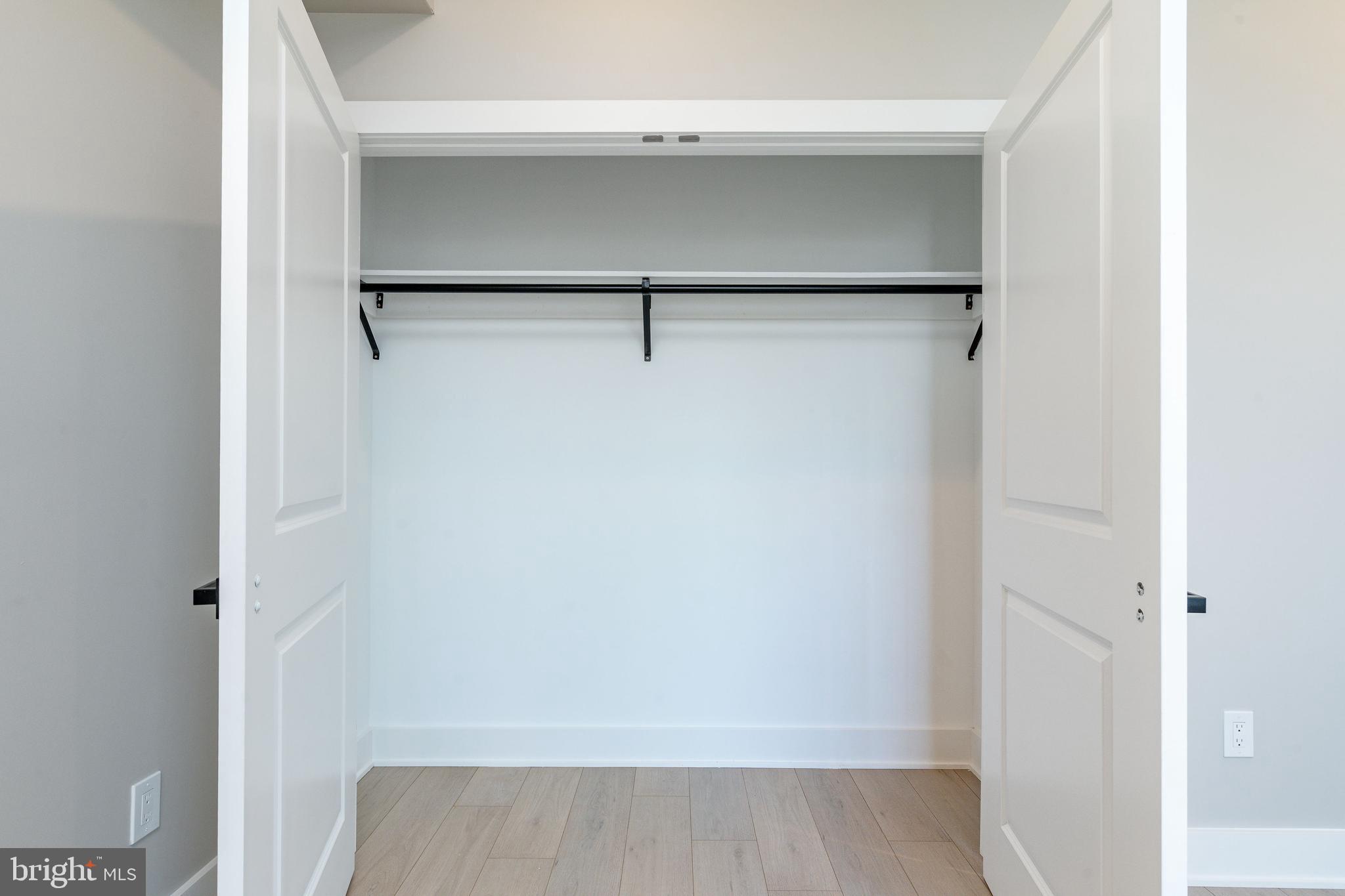 2048 North 3rd Street, Unit 2 Philadelphia, PA 19122 - Photo 14 of 27 a view of walk in closet with empty racks