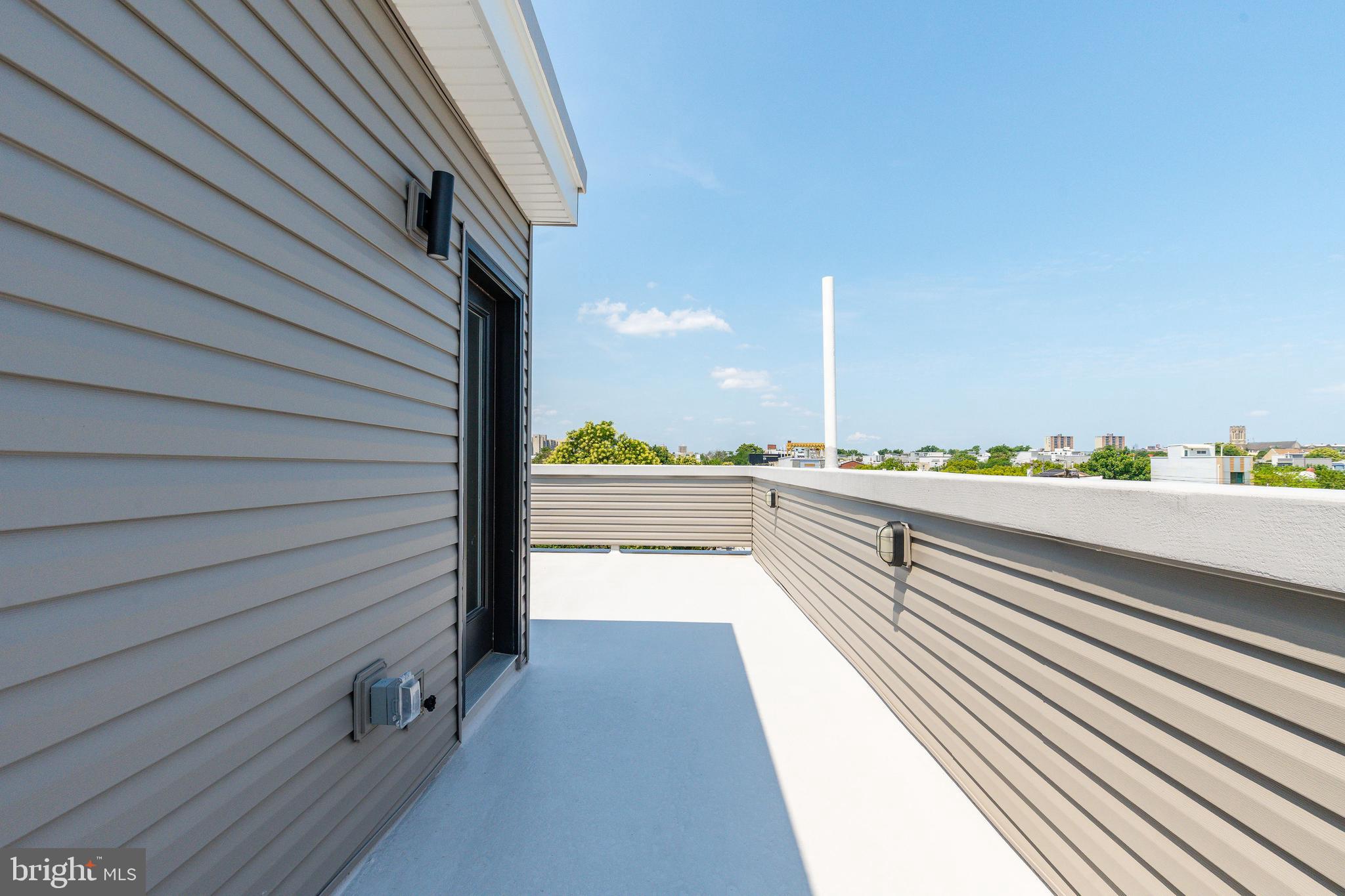 2048 North 3rd Street, Unit 2 Philadelphia, PA 19122 - Photo 18 of 27 a view of balcony with wooden floor
