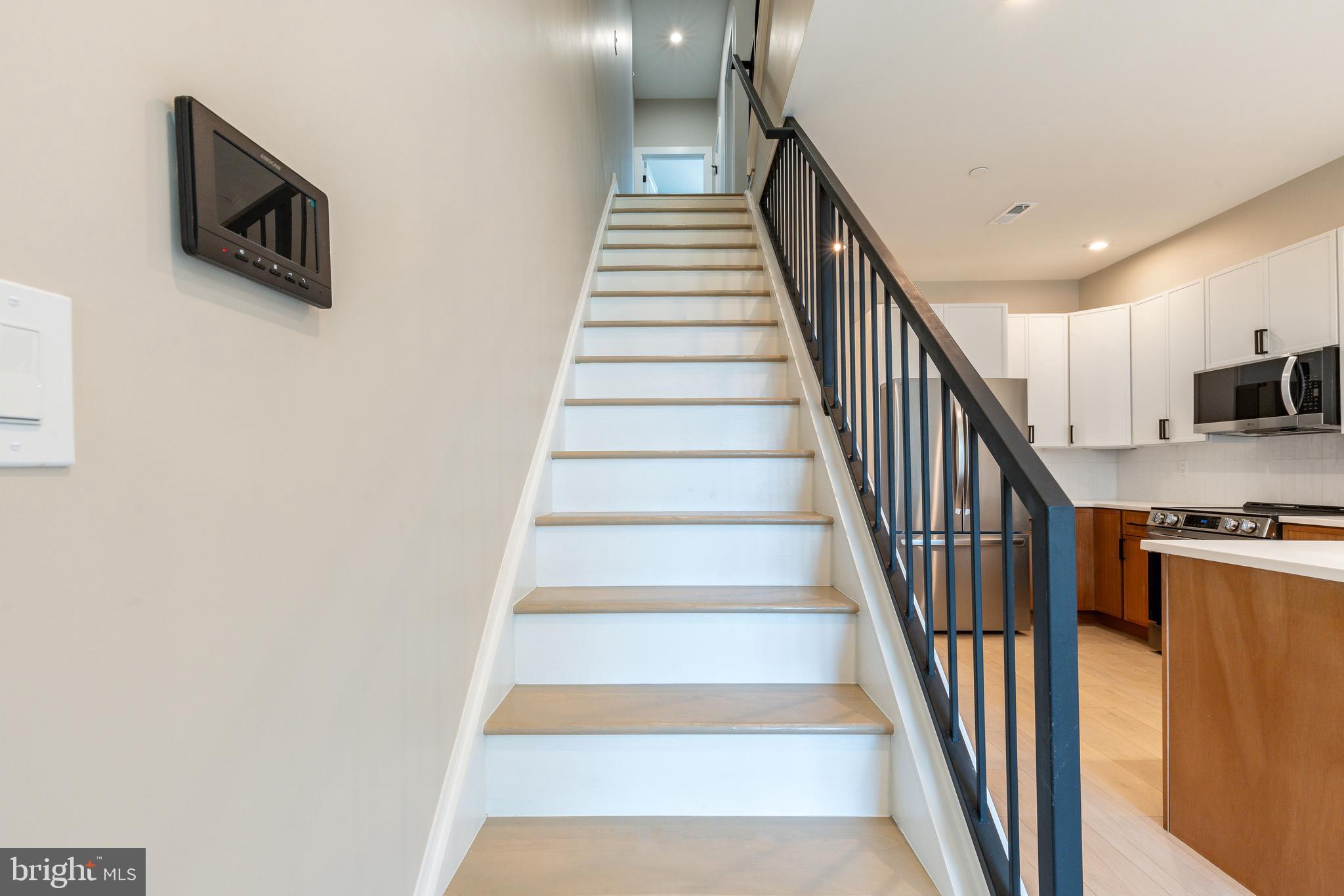 2048 North 3rd Street, Unit 2 Philadelphia, PA 19122 - Photo 10 of 27 a view of entryway and hall with wooden floor