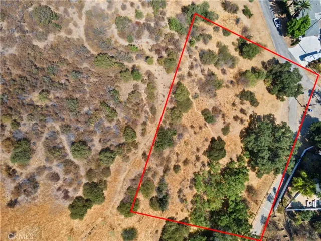 an aerial view of residential house with outdoor space