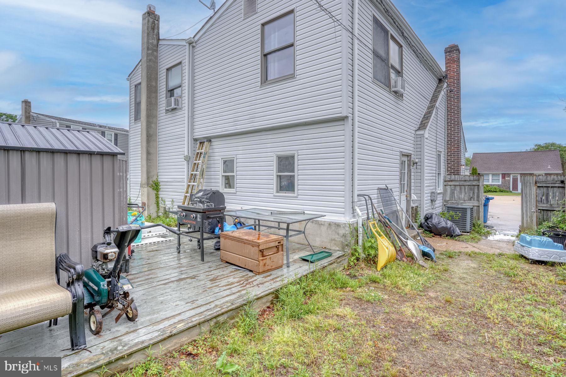 117 Alvil Road Wilmington, DE 19805 - Photo 7 of 41 a view of a backyard with a patio