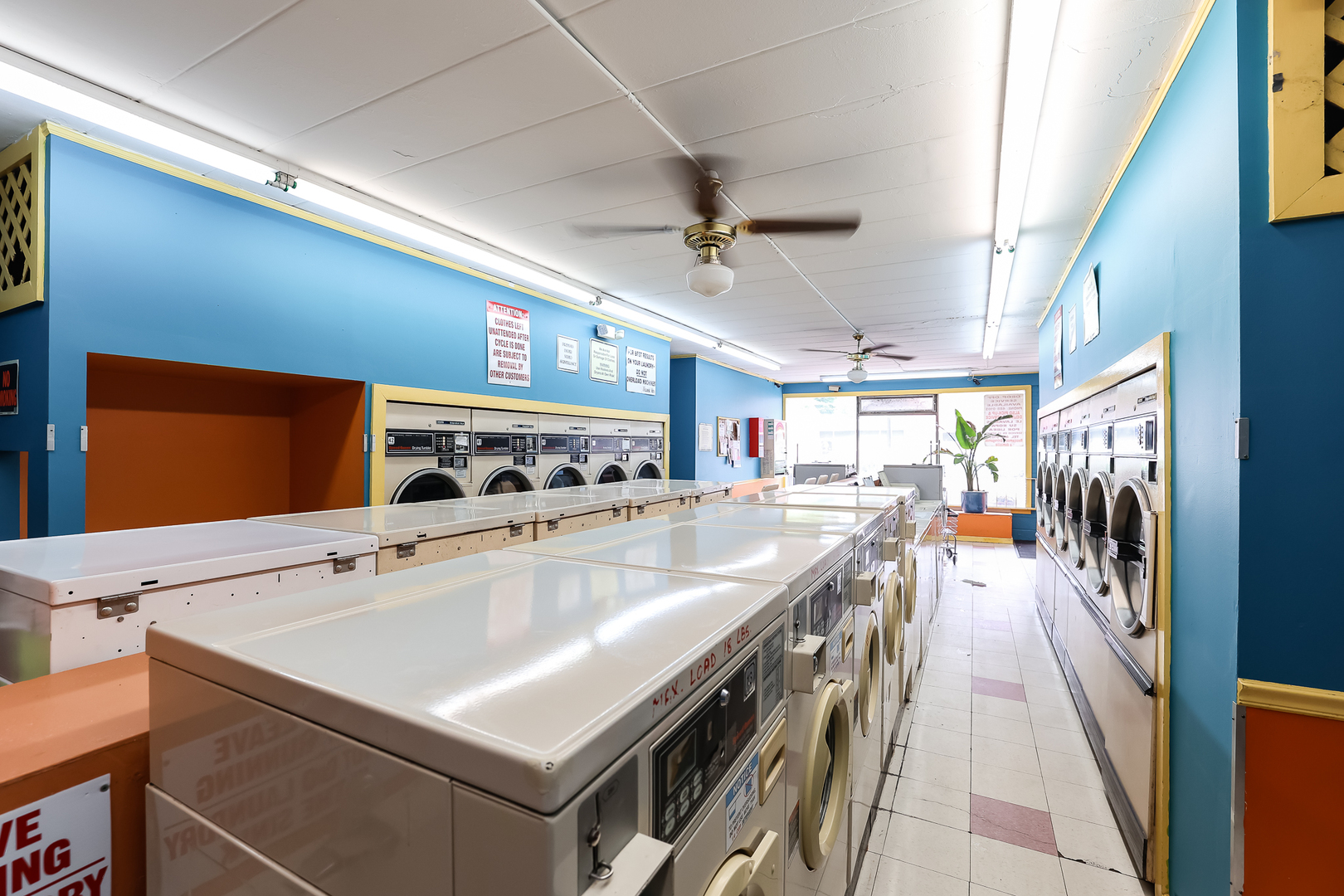 7242 Roosevelt Road Forest Park, IL 60130 - Photo 15 of 36 a large white kitchen with a large window