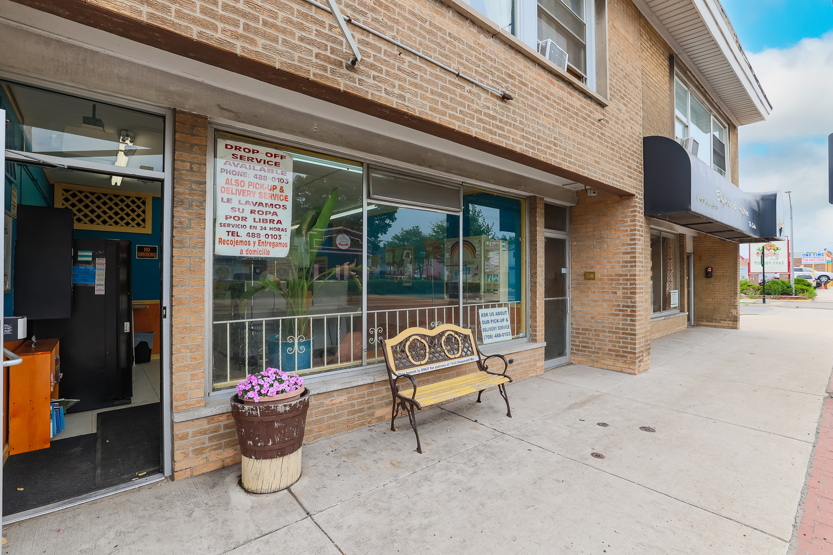 7242 Roosevelt Road Forest Park, IL 60130 - Photo 2 of 36 a building outdoor space with patio furniture and potted plants