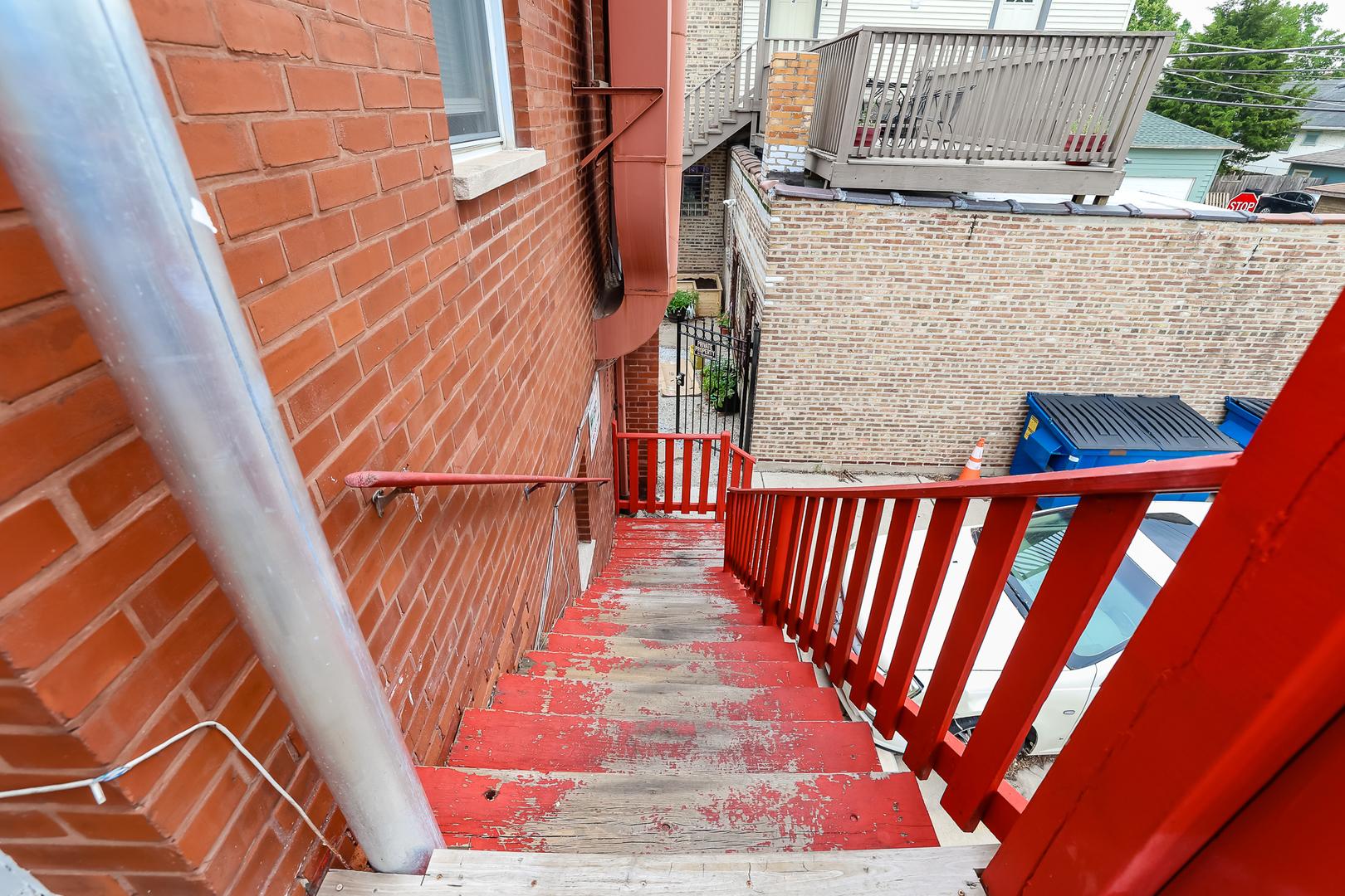 7242 Roosevelt Road Forest Park, IL 60130 - Photo 9 of 36 a view of a balcony with wooden floor and fence