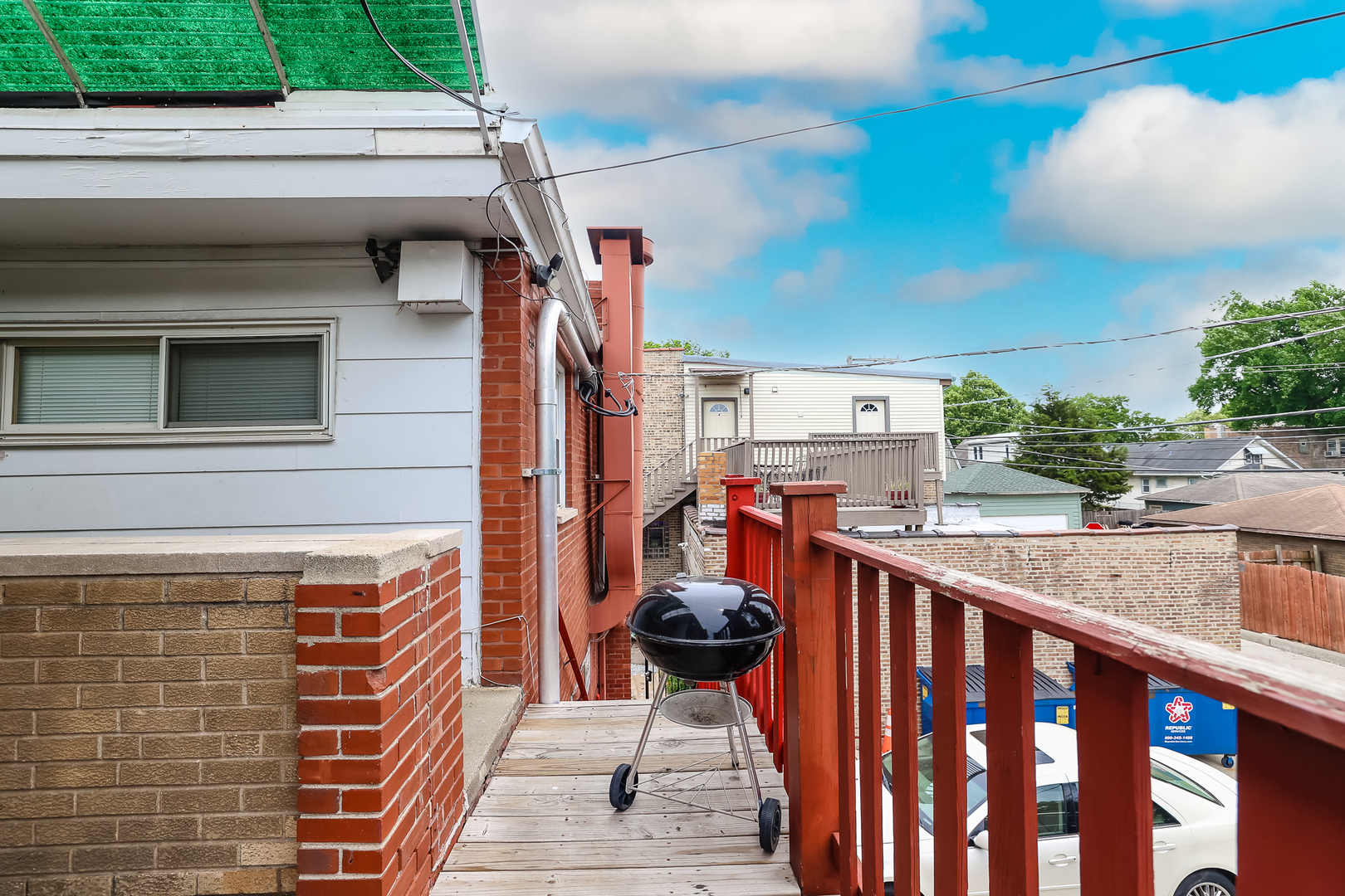 7242 Roosevelt Road Forest Park, IL 60130 - Photo 10 of 36 a balcony view with a sink and wooden floor