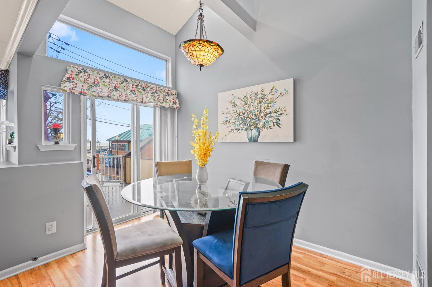 265 Front Street Perth Amboy, NJ 08861 - Photo 19 of 38 a dining room with furniture and window