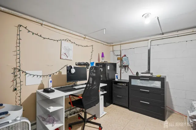 a view of a workspace with furniture