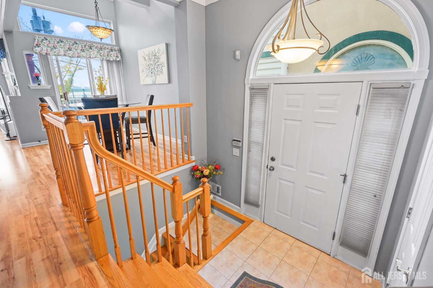 265 Front Street Perth Amboy, NJ 08861 - Photo 9 of 38 a view of front door with stairs