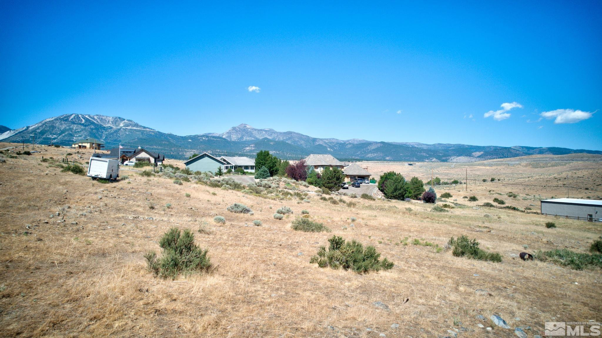 Apn Apn 5017037th, Unit B Reno, NV 89521 - Photo 9 of 14 a view of a beach with a mountain view in back