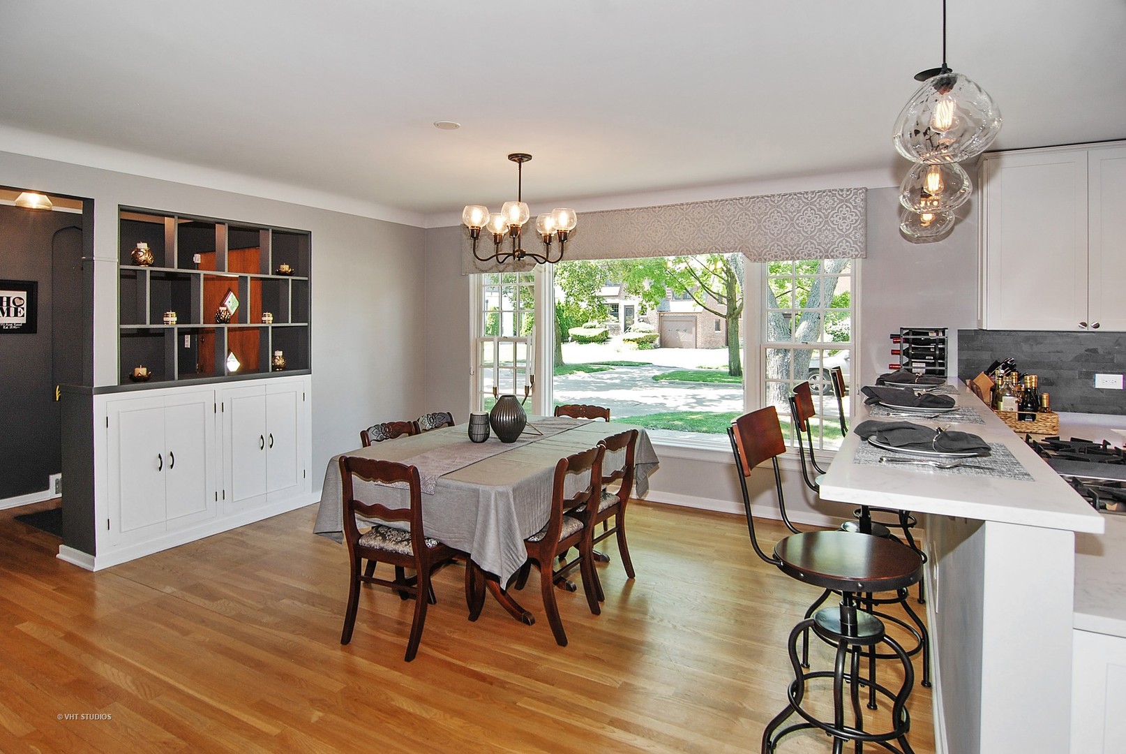 499 Kent Road Riverside, IL 60546 - Photo 11 of 28 a view of a dining room with furniture window and outside view