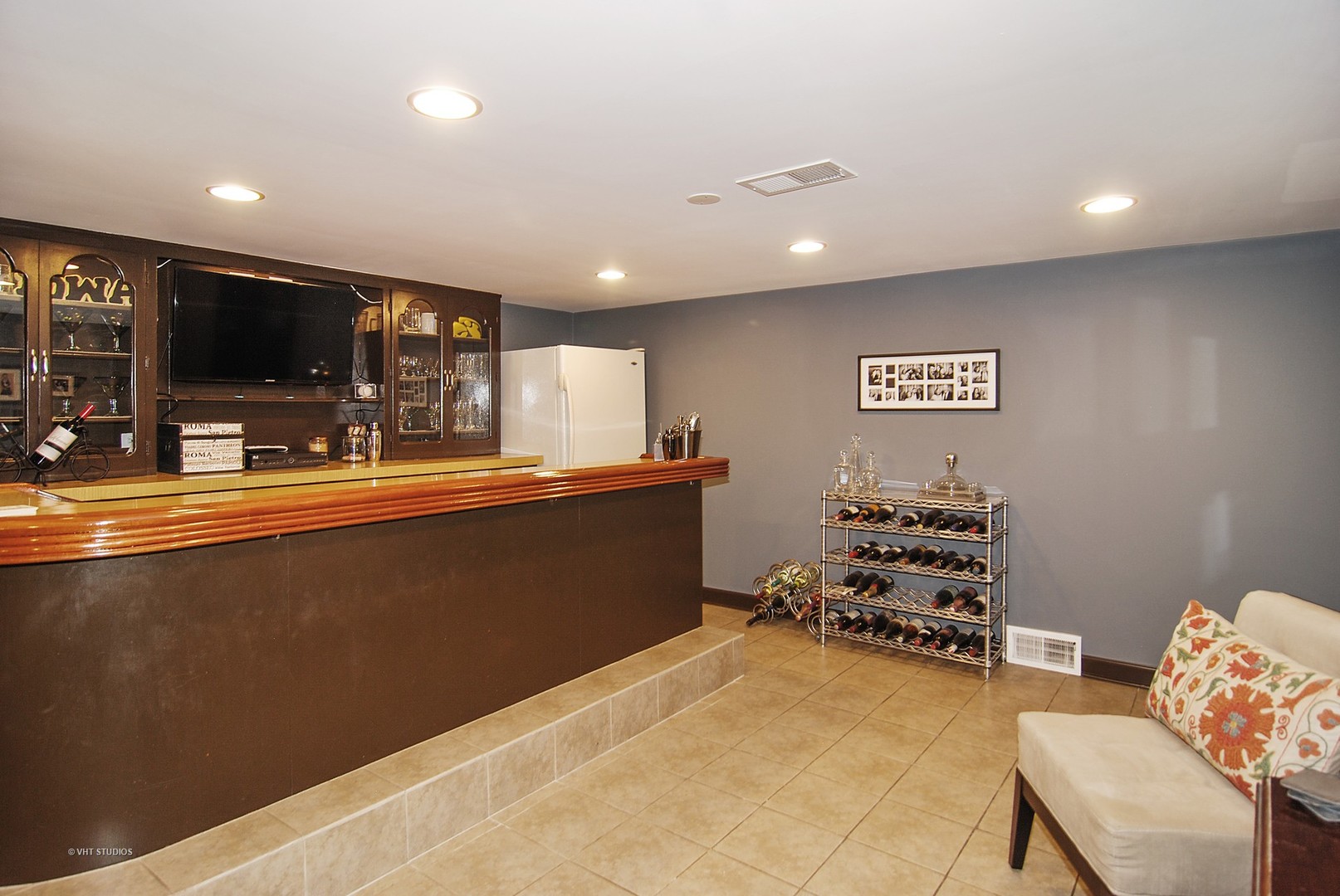 499 Kent Road Riverside, IL 60546 - Photo 23 of 28 a kitchen with stainless steel appliances a refrigerator and a stove top oven