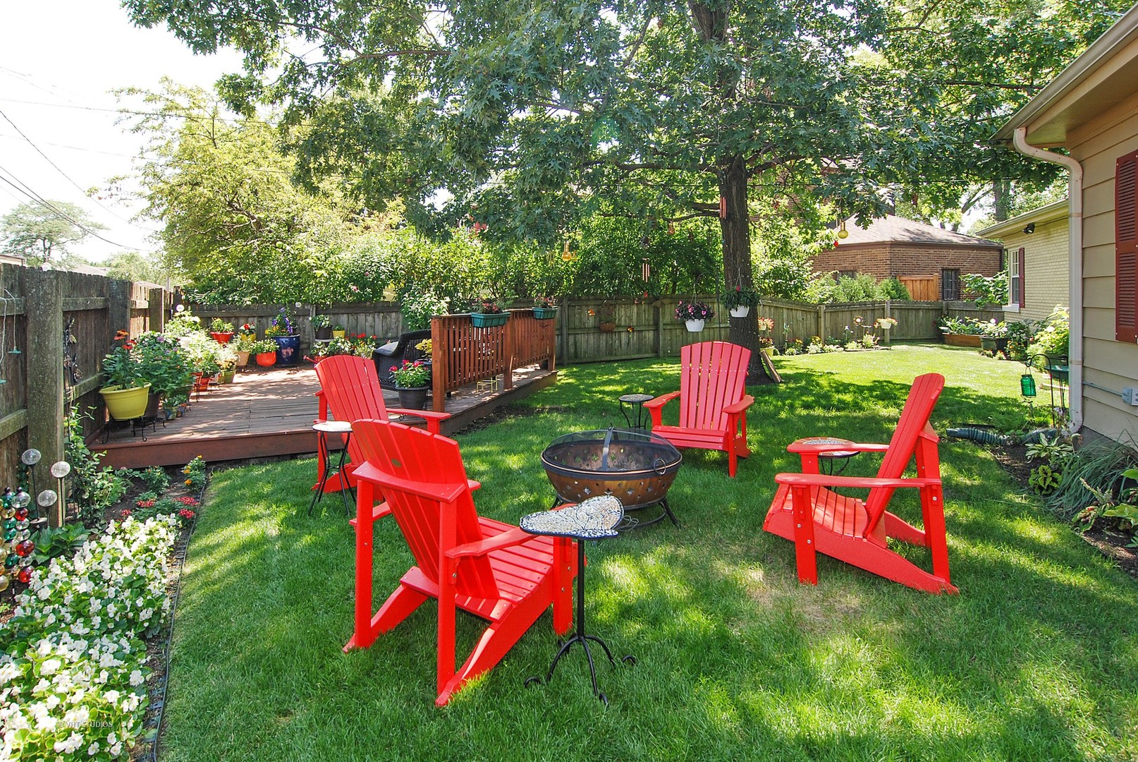 499 Kent Road Riverside, IL 60546 - Photo 24 of 28 a backyard of a house with outdoor seating
