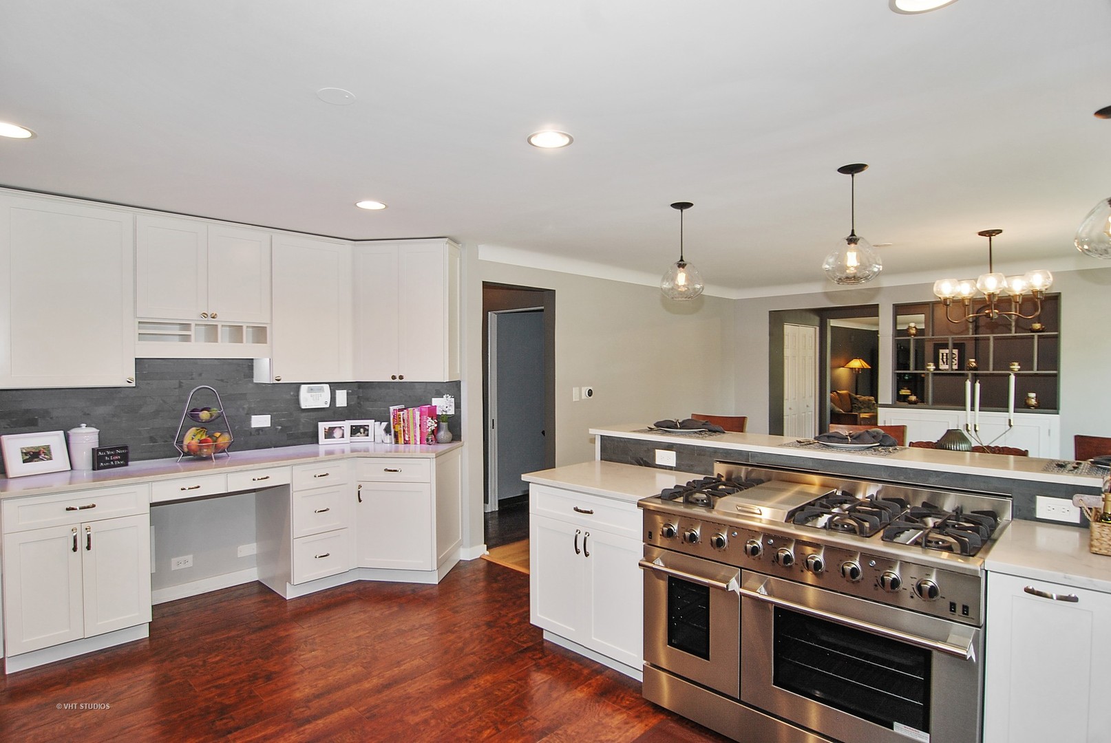 499 Kent Road Riverside, IL 60546 - Photo 8 of 28 a kitchen with a stove and wooden floor