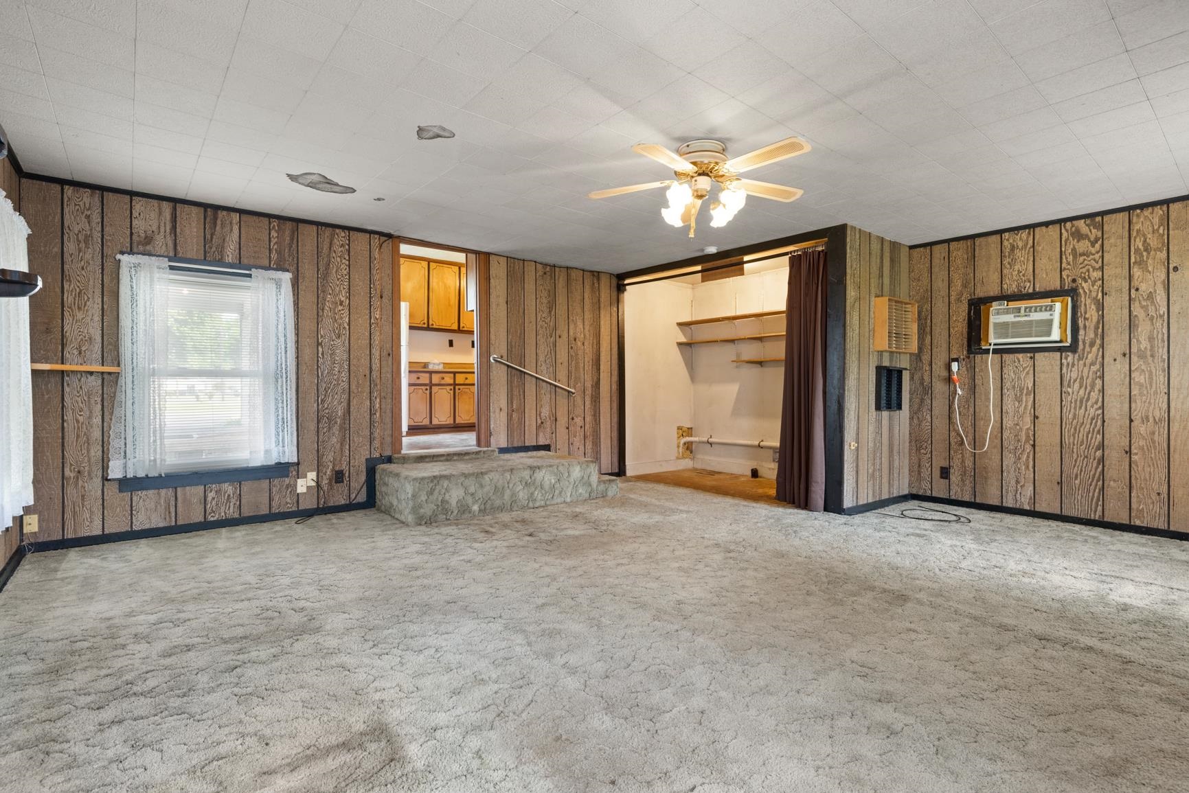 7976 Susan Road Millington, TN 38053 - Photo 13 of 25 an empty room with windows and closet