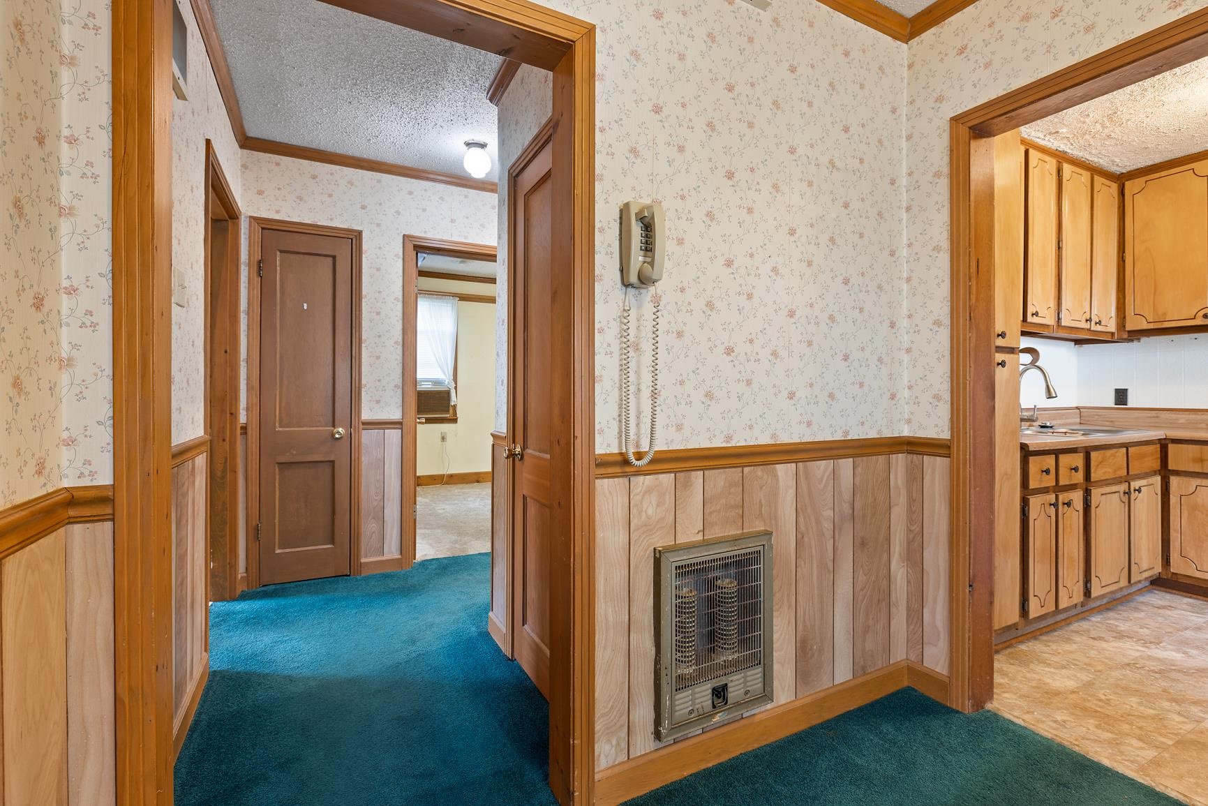 7976 Susan Road Millington, TN 38053 - Photo 19 of 25 a view of a hallway with wooden floor and staircase