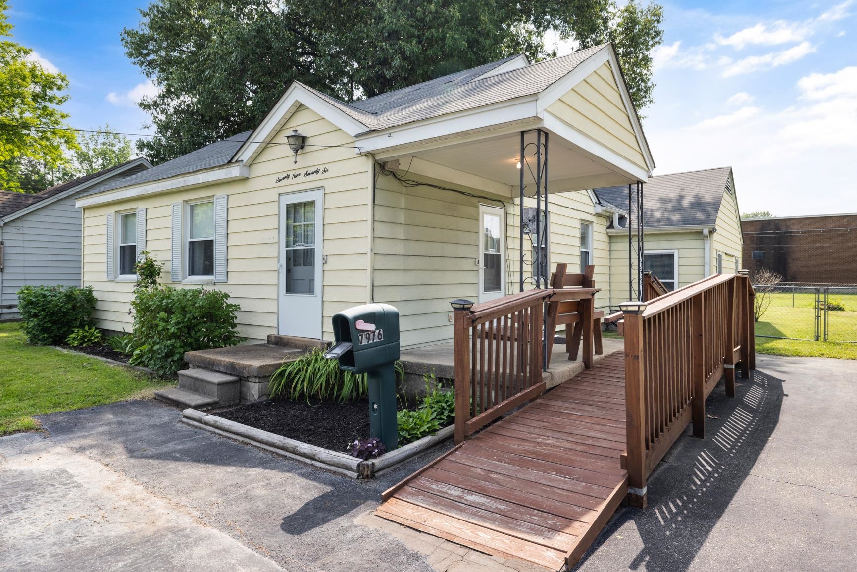 7976 Susan Road Millington, TN 38053 - Photo 2 of 25 a view of a two chairs and table in the patio
