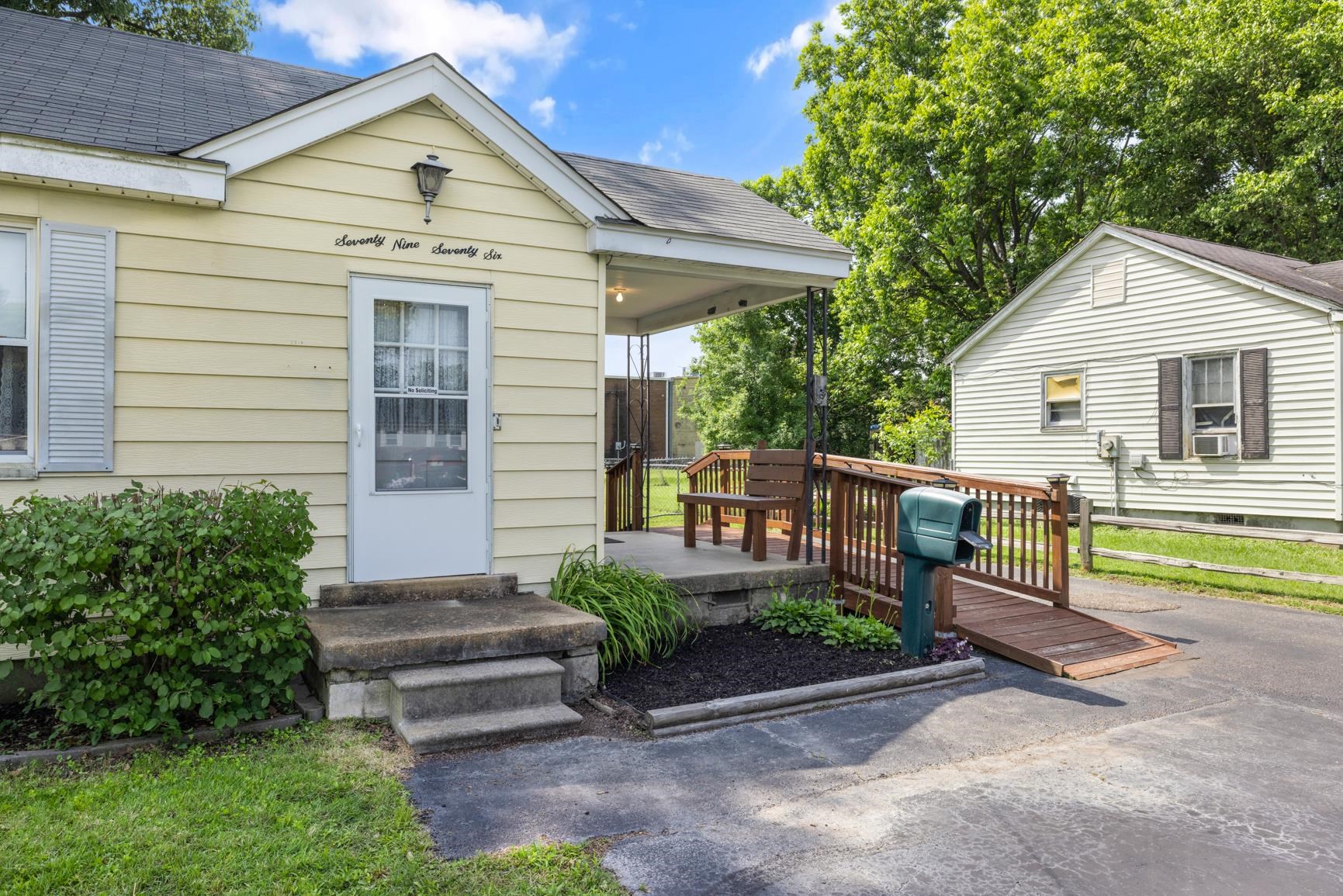 7976 Susan Road Millington, TN 38053 - Photo 3 of 25 a view of a house with a yard and sitting area