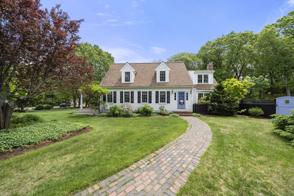 30 Franklin Rodgers Road Hingham, MA 02043 - Photo 2 of 37 a front view of a house with a yard
