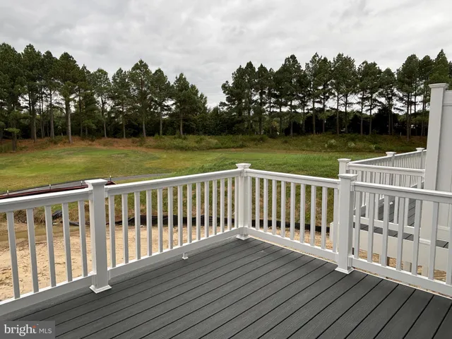 a view of deck with a yard