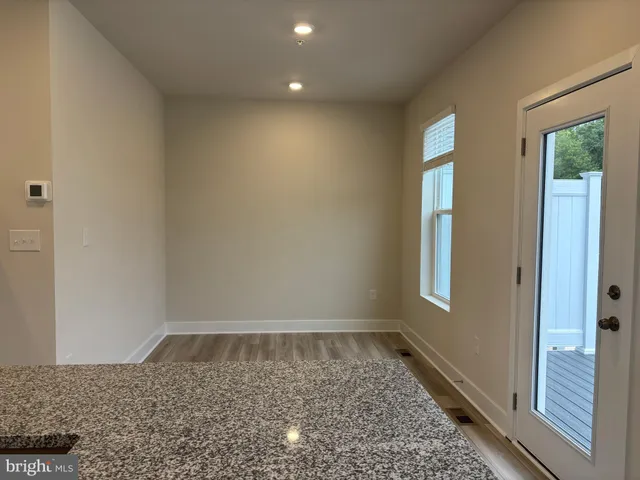 a view of an empty room and window