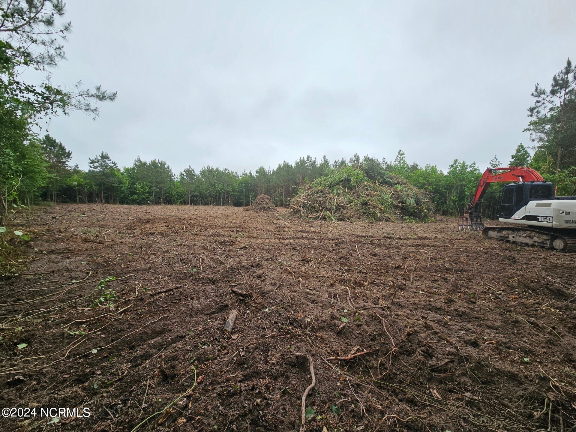 6 East Ridge Road Shawboro, NC 27973 - Photo 2 of 4 Approximately 1 acre cleared with culvert pipe in place.