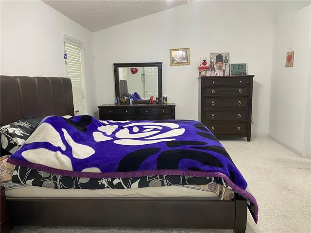 a bathroom with a sink double vanity and a mirror