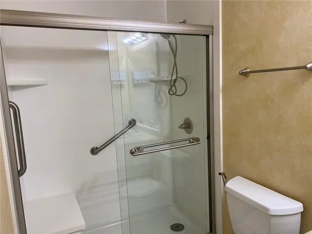 a bathroom with a sink and toilet