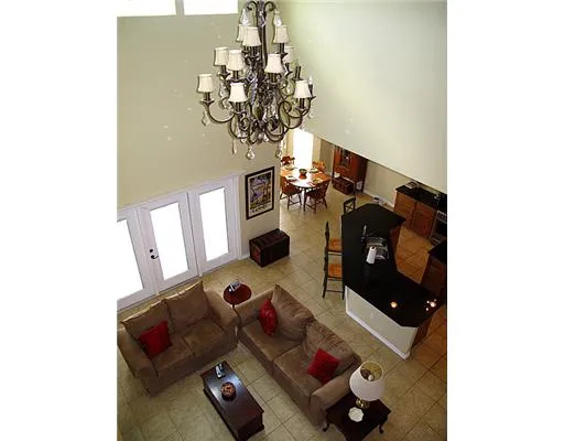 a table with chairs and wooden floor