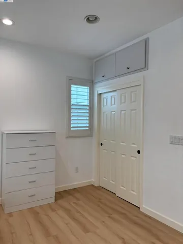 a view of an empty walk in closet