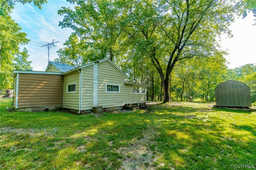1429 Fredericks Hall Road Bumpass, VA 23024 - Photo 29 of 30 a view of a house with a yard