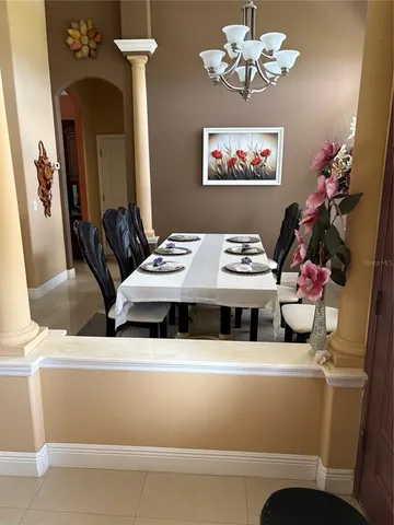 a bathroom with a sink mirror and vanity