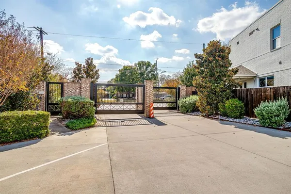 a view of a building with a yard