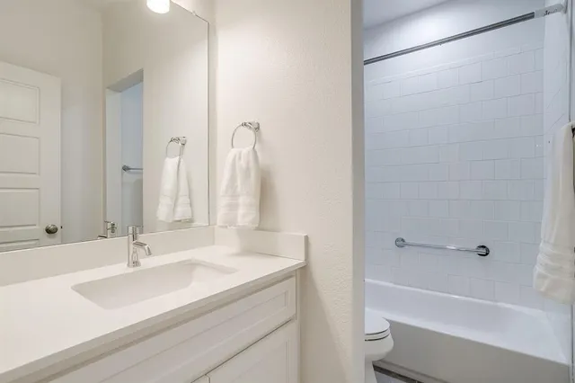 a bathroom with a sink and a bathtub