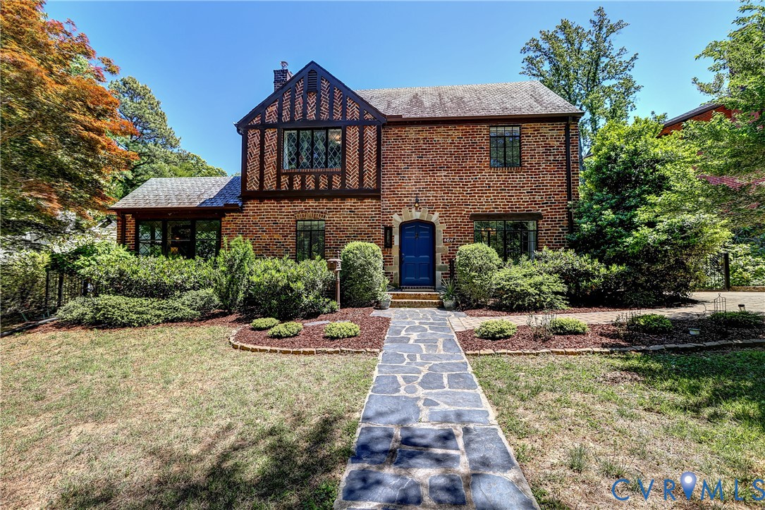 4814 Riverside Drive Richmond, VA 23225 - Photo 2 of 39 a front view of a house with a yard