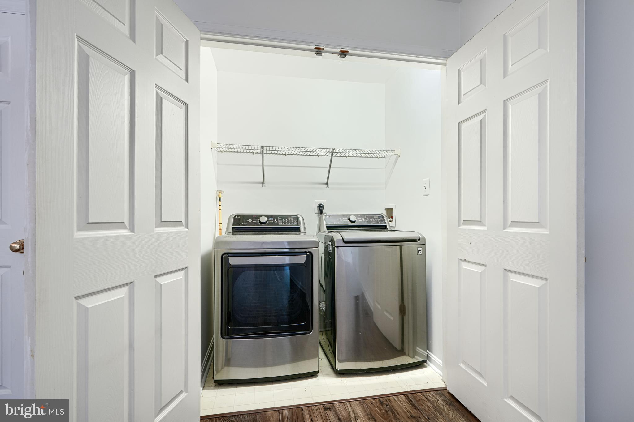8803 Stoneridge Circle, Unit 301 Pikesville, MD 21208 - Photo 15 of 35 Washer dryer on the second floor