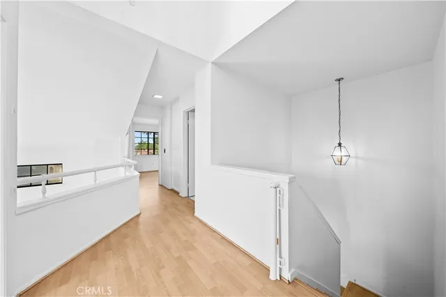 a view of a room with a large window