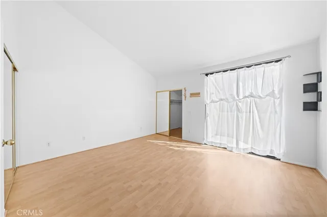 a bathroom with a bath tub with a shower