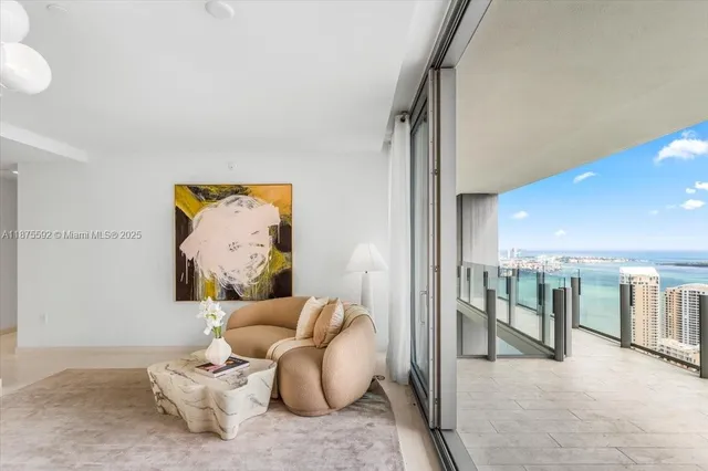 a bathroom with a toilet a sink and shower