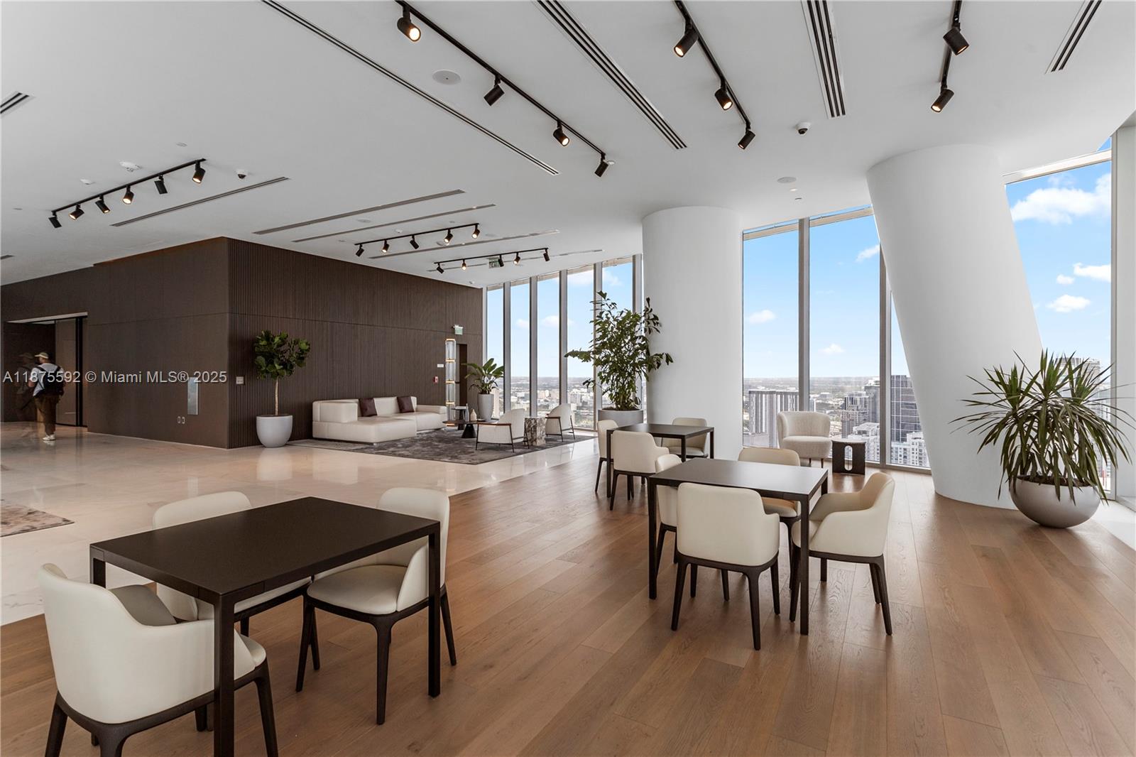 300 Biscayne Blvd Way, Unit 5002 Miami, FL 33131 - Photo 57 of 69 a dining room with furniture and wooden floor