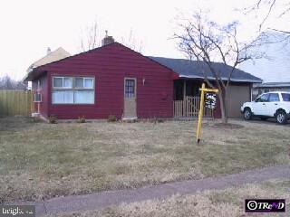 21 Oldbrook Road Levittown, PA 19057 - Photo 1 of 1 a front view of a house with a yard