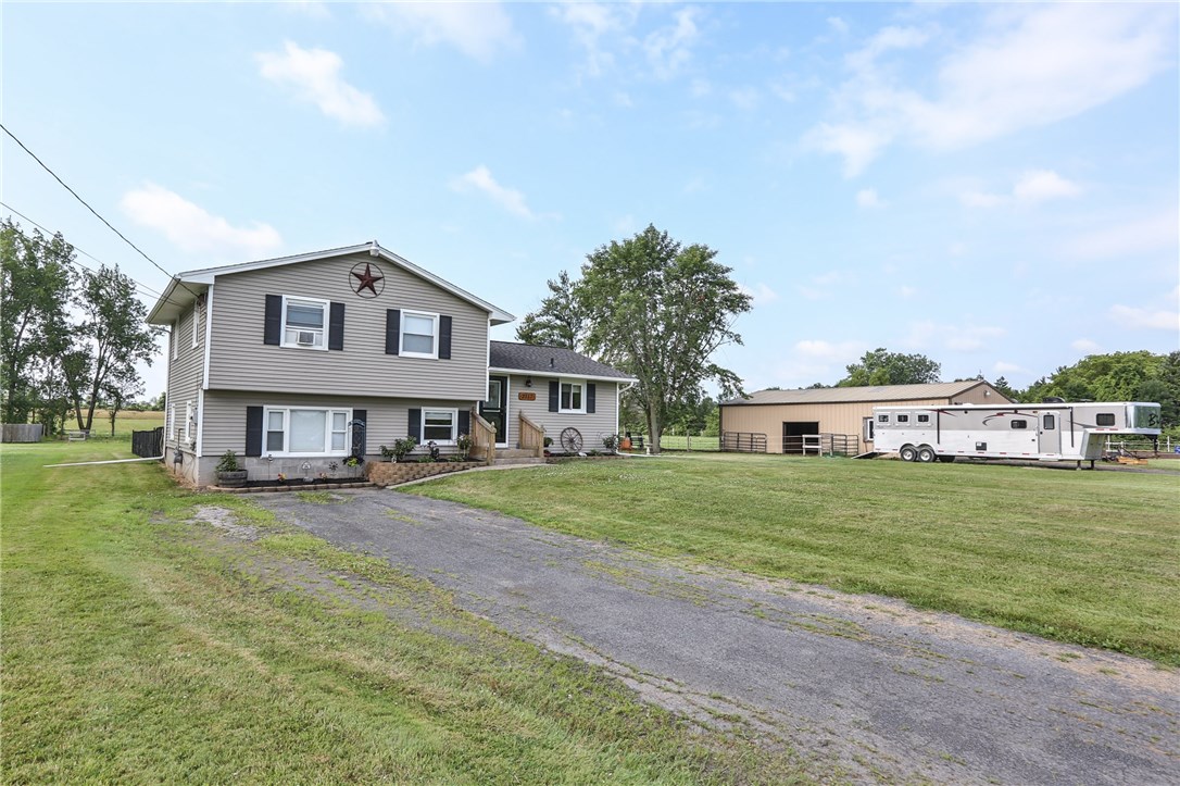 2057 North Hamlin Road Hamlin, NY 14464 - Photo 1 of 1 Remodeled split level with pole barn, outdoor ridi