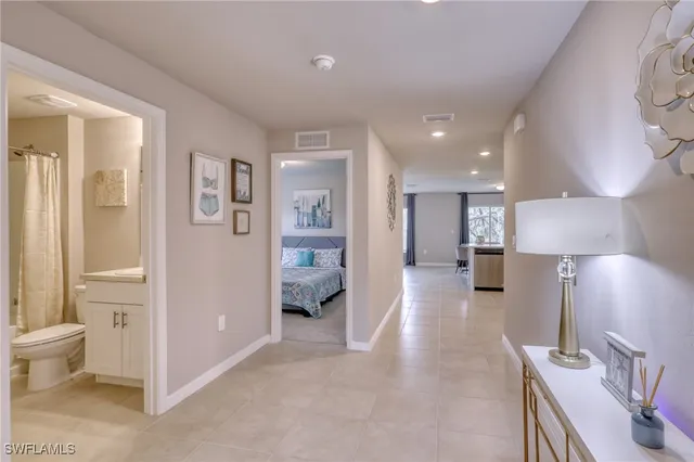 a kitchen with microwave cabinets and stove top oven