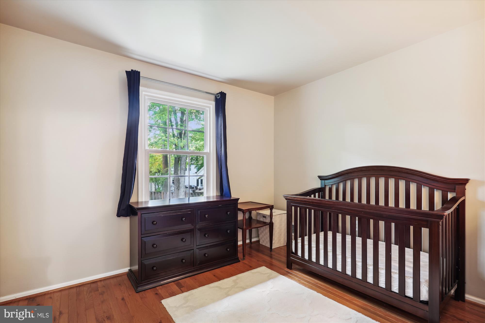 8322 Riverside Road Alexandria, VA 22308 - Photo 19 of 38 a bedroom with furniture and a window