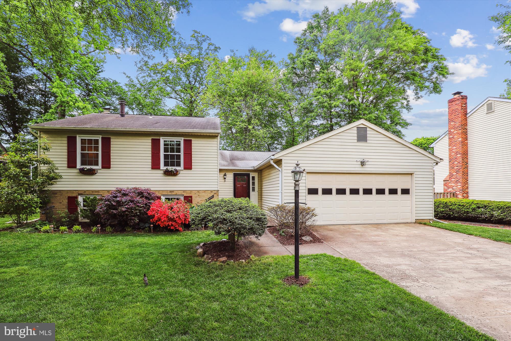 8322 Riverside Road Alexandria, VA 22308 - Photo 2 of 38 a view of an house with backyard space and garden