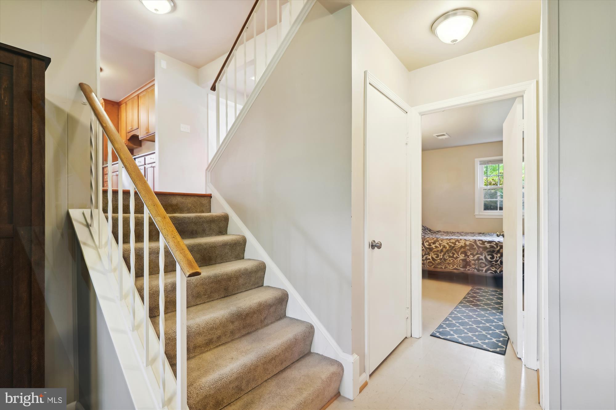 8322 Riverside Road Alexandria, VA 22308 - Photo 22 of 38 a view of a hallway with wooden floor and entryway