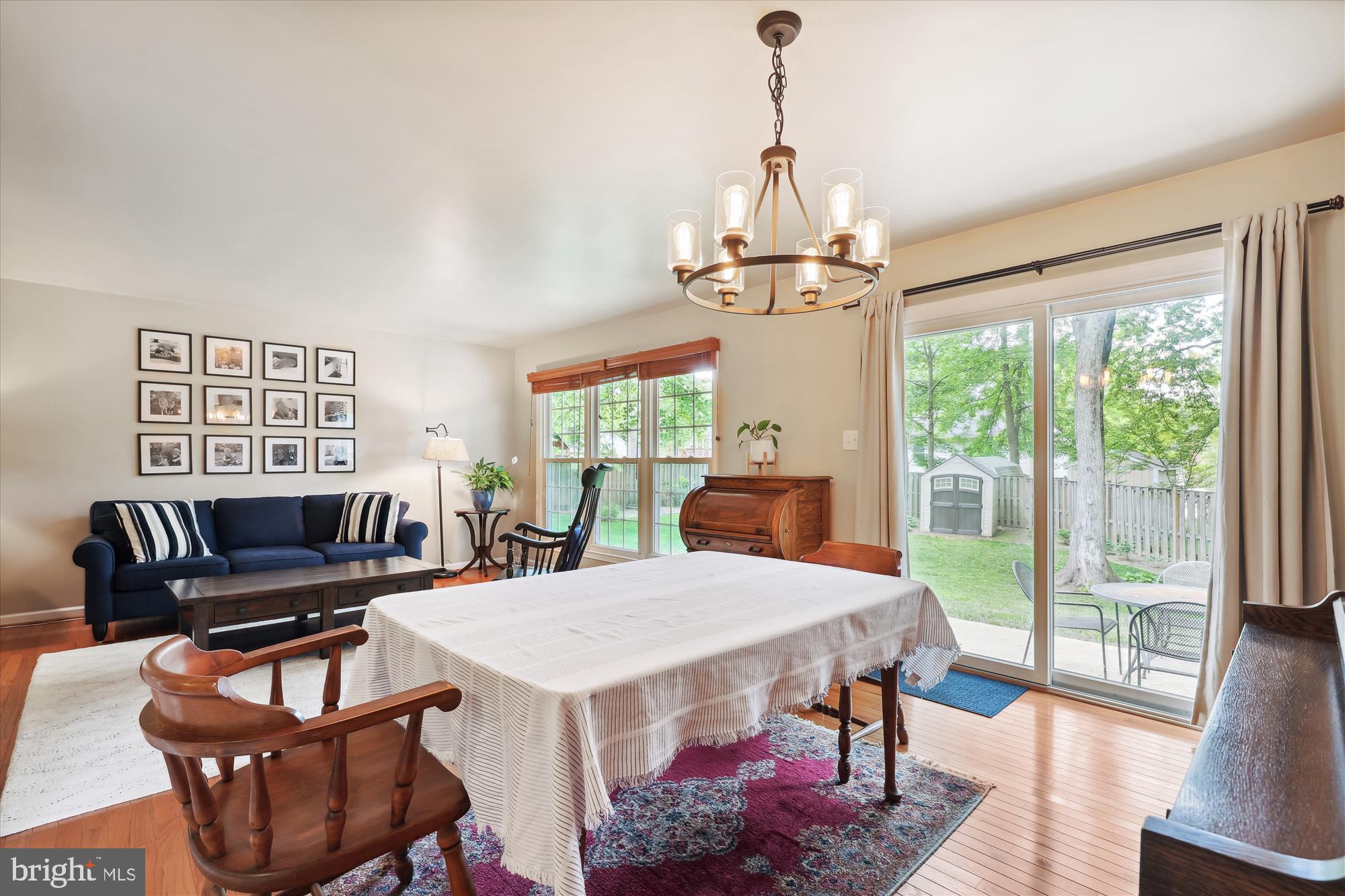 8322 Riverside Road Alexandria, VA 22308 - Photo 3 of 38 a view of a dining room with furniture wooden floor and chandelier